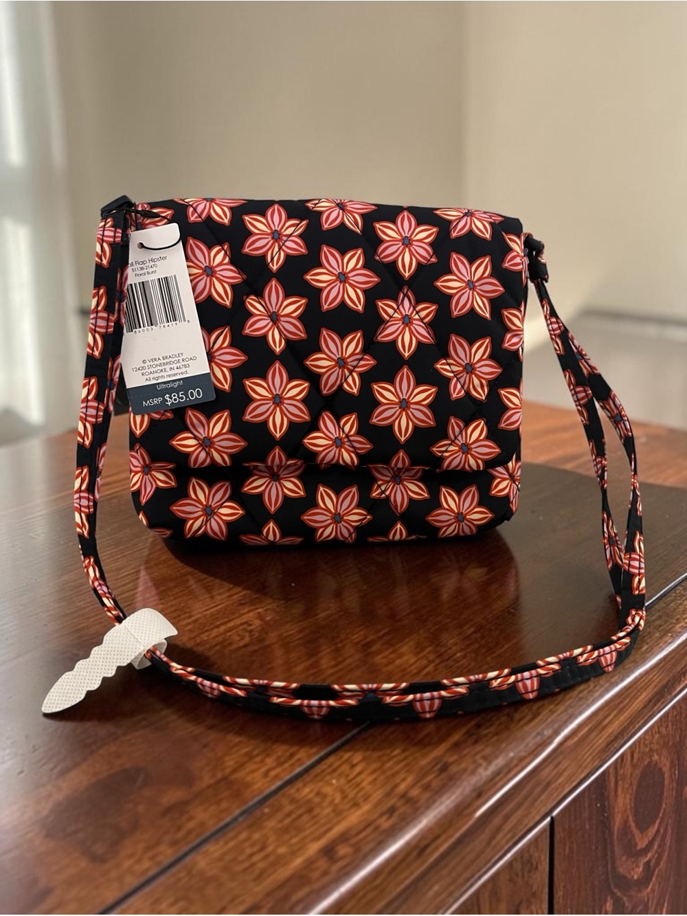 Vera Bradley Navy Blue and Floral Crossbody Bag with Red-Orange Star Pattern